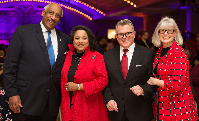 Edgar Smith, Toni Smith, John Morris Russell, and Thea Tjepkema celebrate after Classical Roots on March 8.jpg