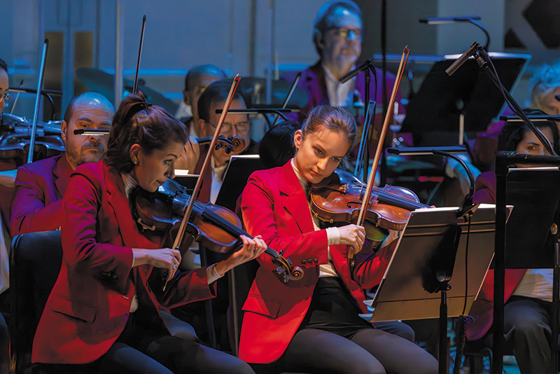 The concertmaster also prepares and leads the Orchestra for each Pops concert. Below, Stefani Matsuo and Felicity James sit side by side at the October 2023 Pops concert. Credit: Charlie Balcom 