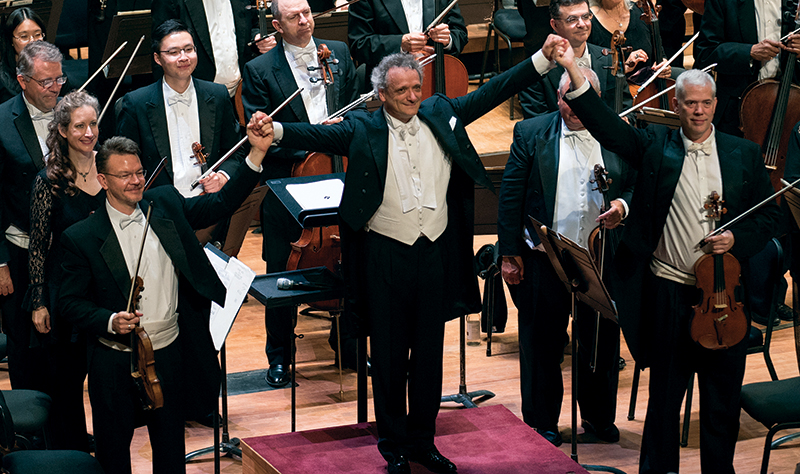 Louis Langrée, taking bows with then-Concertmaster Tim Lees (left) and Principal Viola Christian Colberg, after the opening concert of the 2017–18 season. Credit: AJ Waltz