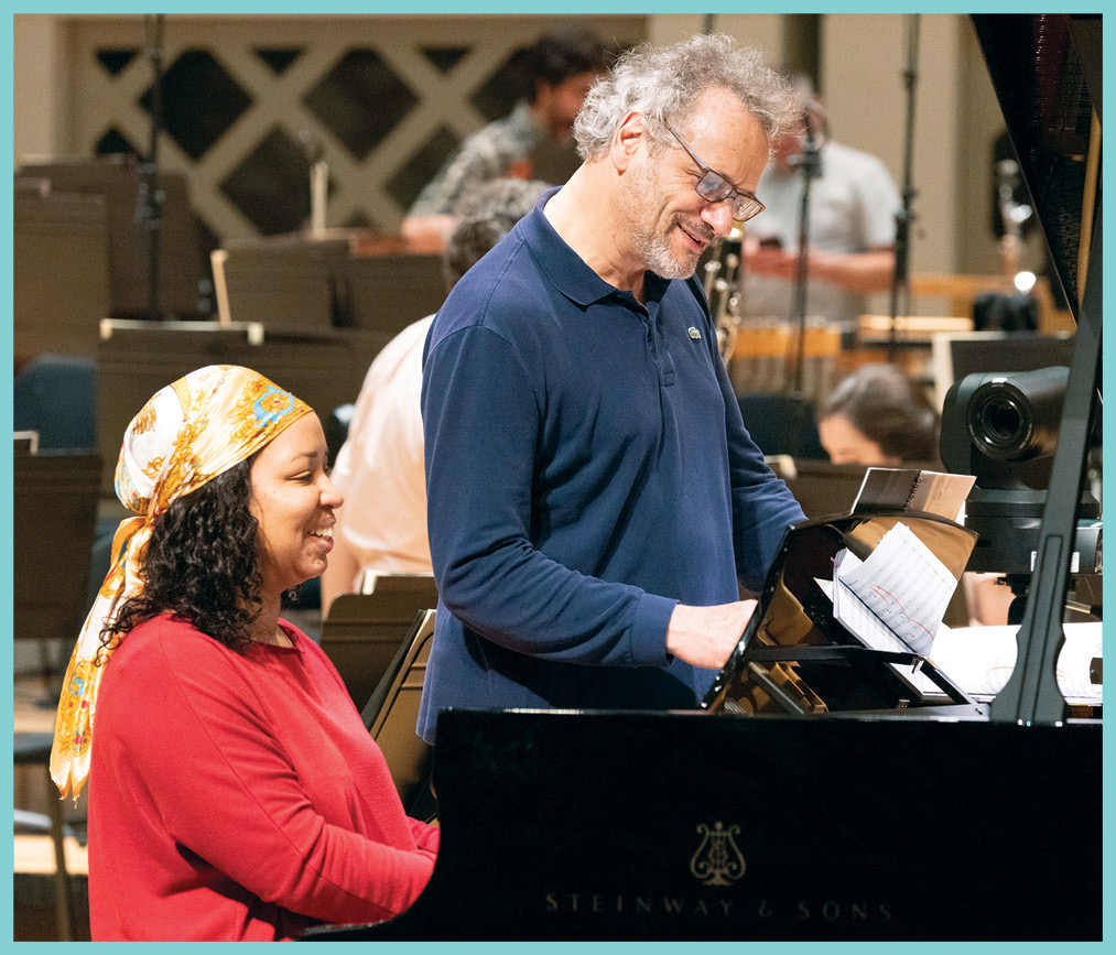 Louis Langrée works with composer-pianist Courtney Bryan in rehearsal for the world premiere of her piano concerto, House of Pianos, May 2023. Credit: Charlie Balcom